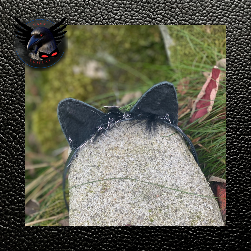 Headband displayed on a granite rock against grass and moss with autumn leaves. Displaying black pigskin inner ears, hand stitched. Headband displayed on a granite rock against grass and moss with autumn leaves. Displaying black pigskin inner ears, hand stitched.
